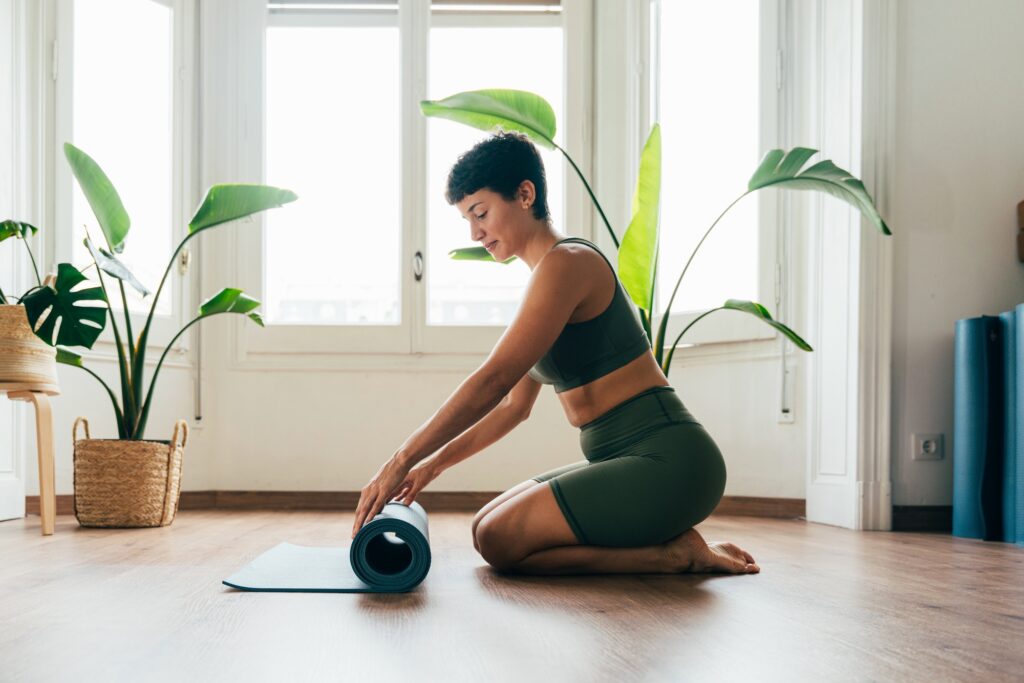 Beautiful sporty girl making yoga training