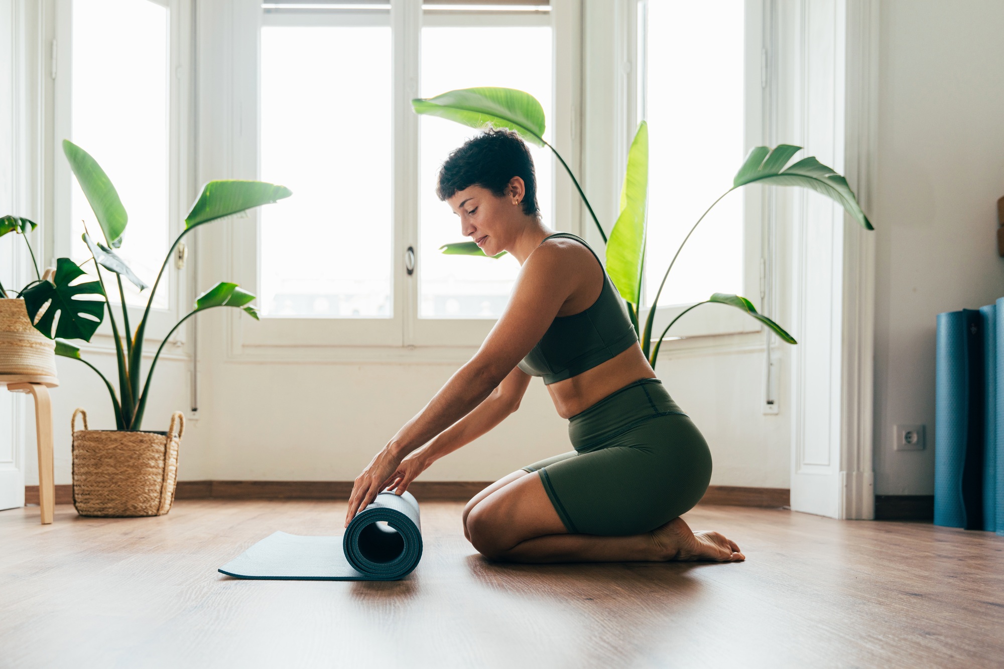 Beautiful sporty girl making yoga training