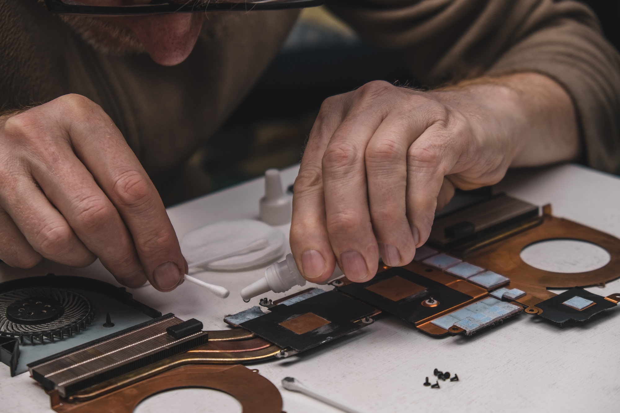 Maintenance and modernization of computer components. Laptop repair. Close-up.